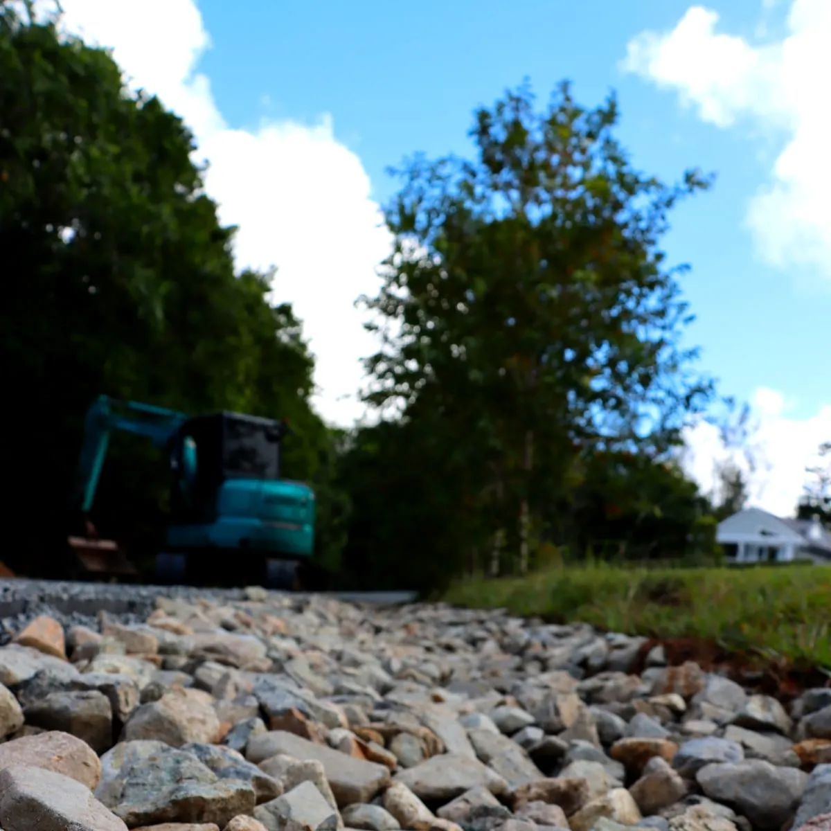 Premium river-stone finish — Eumundi, by Adams Earthworx